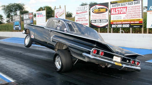 MIGHTY Chevrolet Impala Twisting Wheelstand in Drag Race! MOTHERLOAD OF Horsepower!
