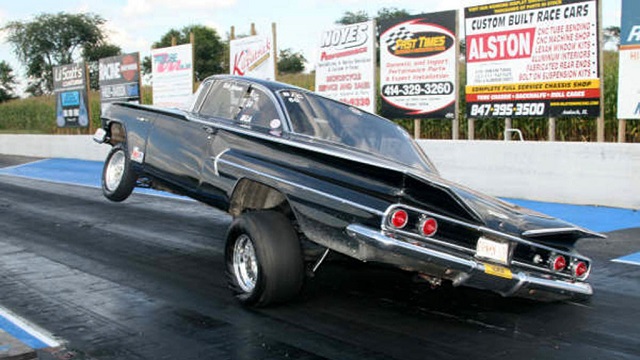 MIGHTY Chevrolet Impala Twisting Wheelstand in Drag Race! MOTHERLOAD OF Horsepower!